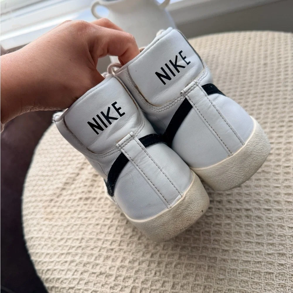 Nike Womens White High-Top Sneakers with Black Swoosh